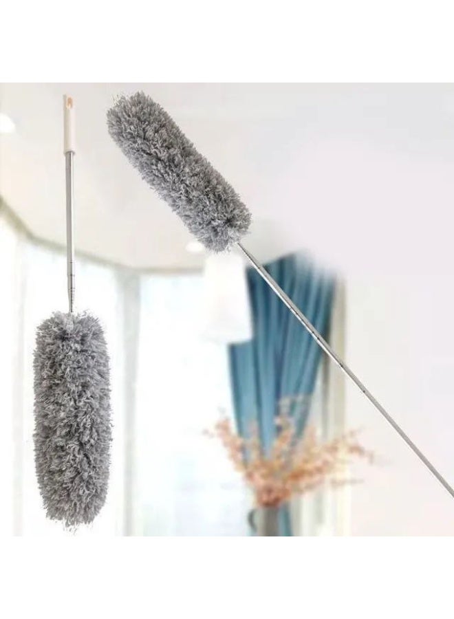 Cleaning high spots and smooth surfaces effortlessly is achieved with this smart 2-in-1 duster and squeegee tool. The dual-action head effectively removes dust and cobwebs from ceilings and walls, while the flexible squeegee blade wipes windows and floors dry without leaving streaks. Equipped with an adjustable extended handle, it reaches difficult areas safely without needing a ladder, providing a versatile solution for home cleaning routines. - Image 1