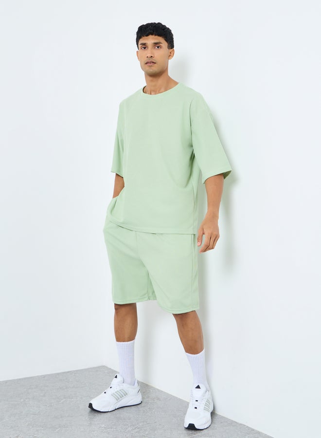 ستايلي طقم تي شيرت وشورت فضفاض محبوك بنقوش صلبة من ستايلي - Image 1