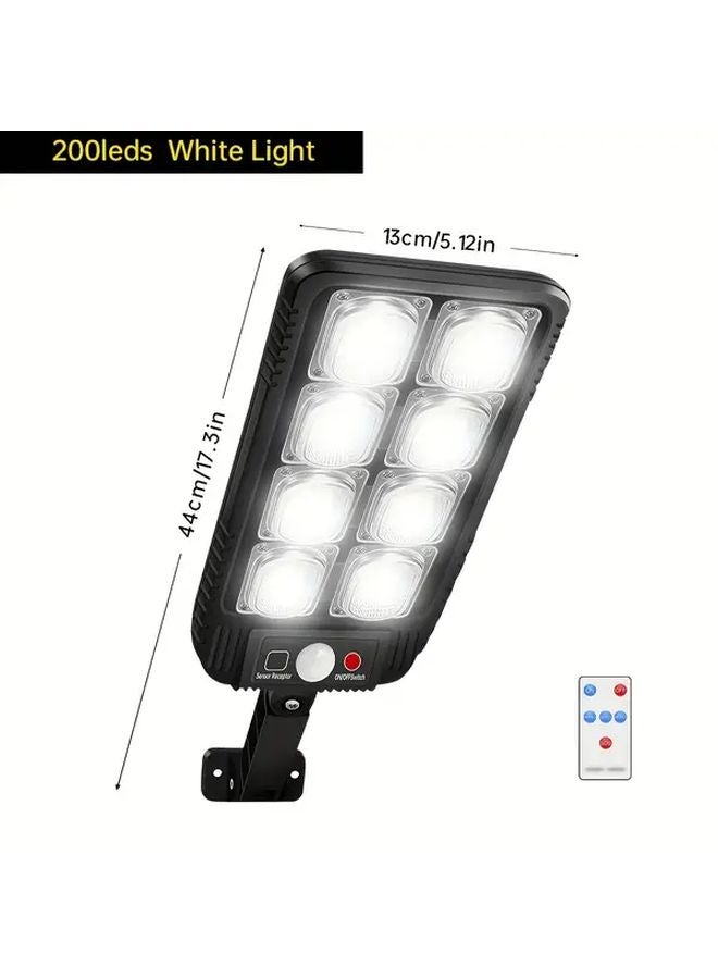 1 قطعة 200 مصباح LED خارجي للجدار بالطاقة الشمسية مع حساس حركة مقاوم للماء IP65 وتحكم عن بعد - Image 1