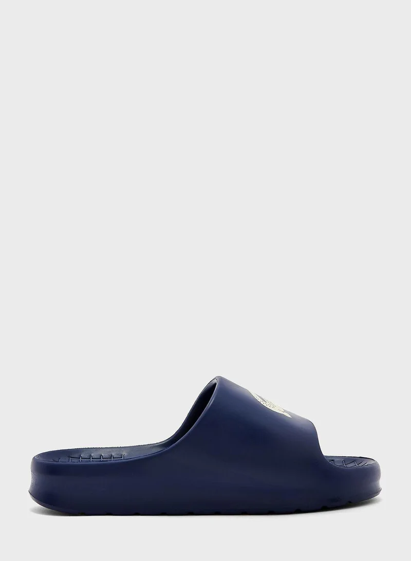 LACOSTE Slides & Sandals