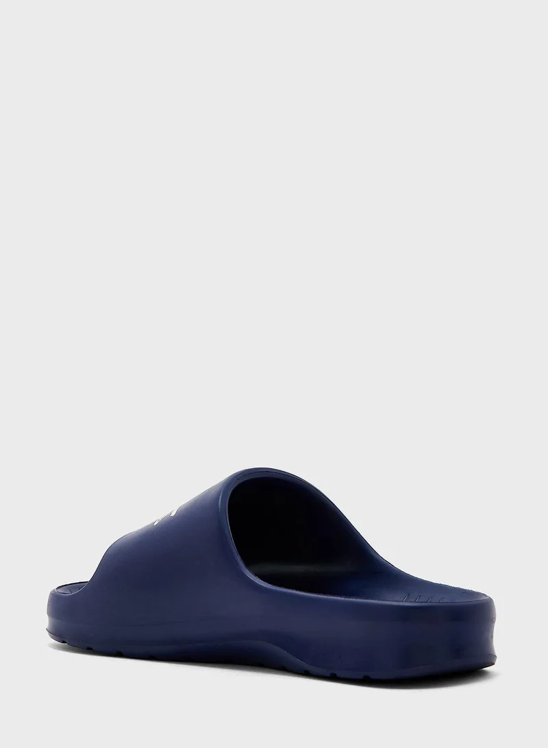 LACOSTE Slides & Sandals