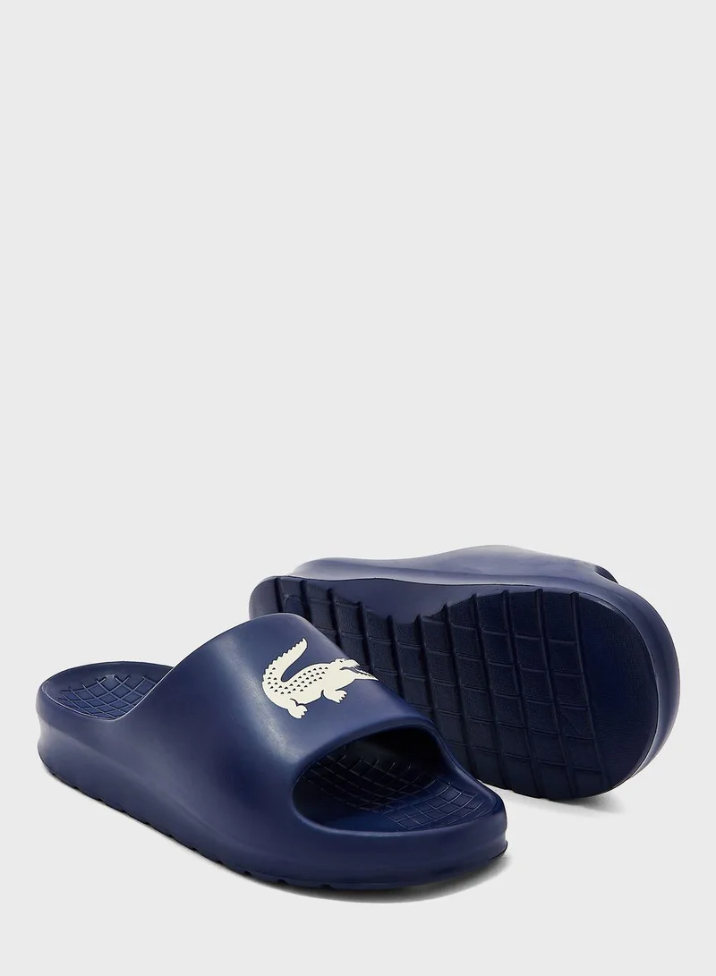 LACOSTE Slides & Sandals