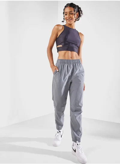 نايكي 7/8 بنطال رياضي دافئ متوسط الارتفاع من Fast Dri-Fit