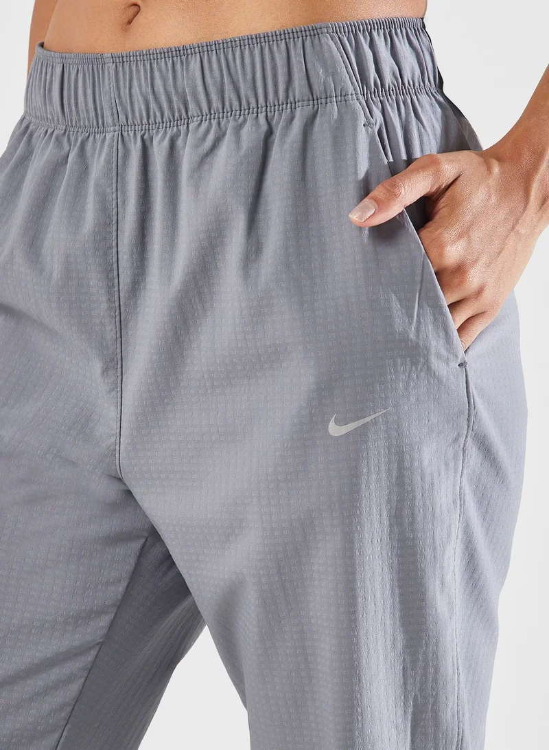 Nike 7/8 Fast Dri-Fit Warm Mid Rise Sweatpants