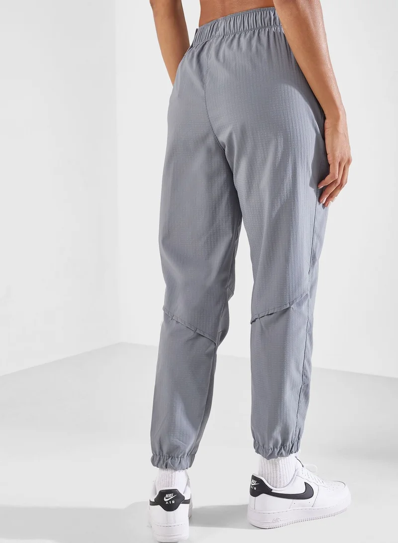 Nike 7/8 Fast Dri-Fit Warm Mid Rise Sweatpants