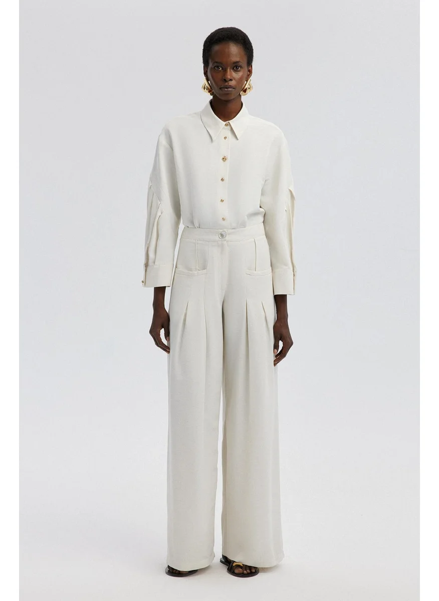 تاتشي Pocket Detailed Wide Leg Linen Trousers