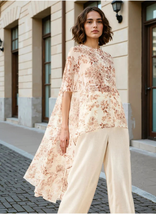 ايكونيك Iconic All-Over Floral Print High Low Cape Top