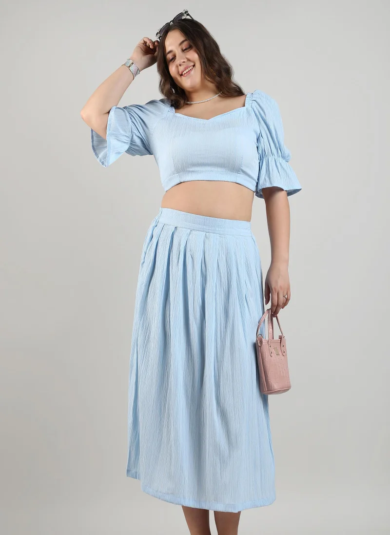 انستافاب بلس طقم نسائي قصير أزرق فاتح من إنستافاب بلس للملابس الكاجوال بأكمام منفوشة ورقبة قلب من مزيج البوليستر بفتحة مريحة للاستخدام اليومي