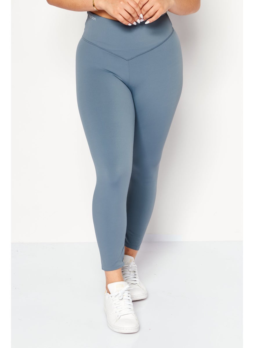 TRIUMPH Women Sportswear Fit 7/8 Length Solid Training Leggings, Grey  - Image 1