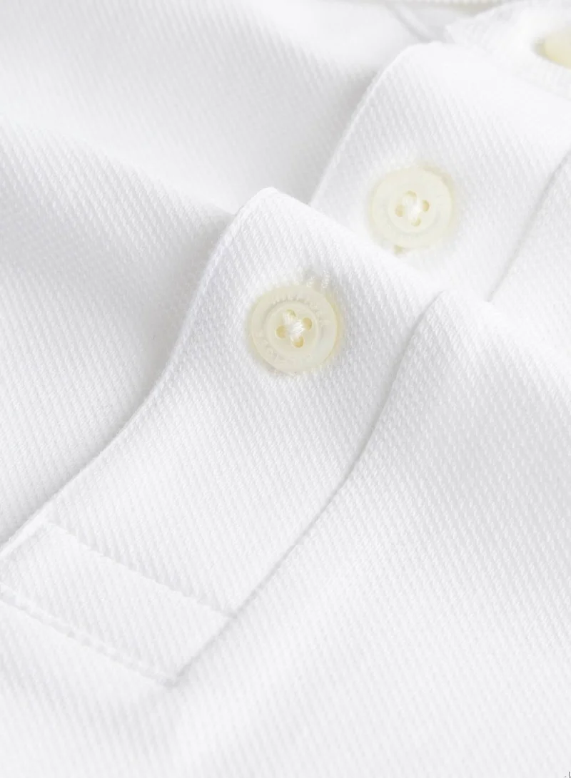 Tommy Hilfiger White 1985 Slim Fit Pique Polo Shirt for Men | Best Price UAE