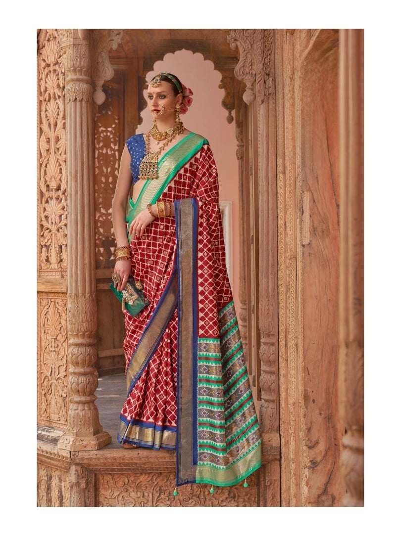 Grab Mantra - Traditional Silk Red Saree With Green Border And Pallu Having Patola Design Plus Unstitched Blue Blouse - Image 1