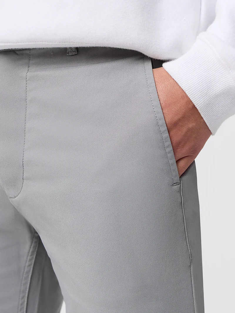 The Souled Store  The Souled Store : Chino Trousers Men And Boys Grey Solid Cotton Spandex Straight Fit Stretch Elasticated Waistband Trousers  | Best Price UAE
