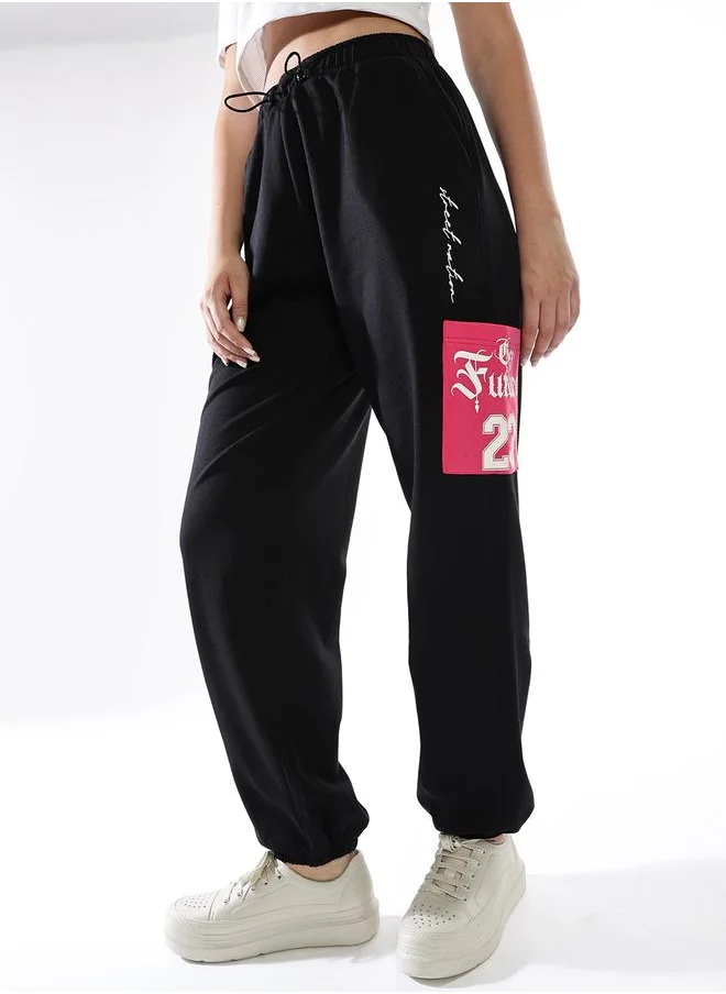 هوبرهولمي Women Track Pants in Multicolor featuring Jogger fit with a colourblocked pattern, no sleeves, regular length, secured with elasicated + drawstring closure, crafted from terry – your go-to choice for effortless elegance.