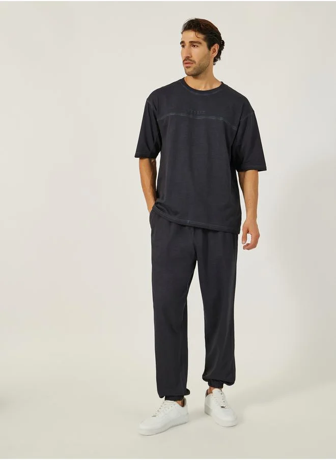 ستايلي Acid Wash Round Neck T-Shirt and Oversize Joggers Co-Ords