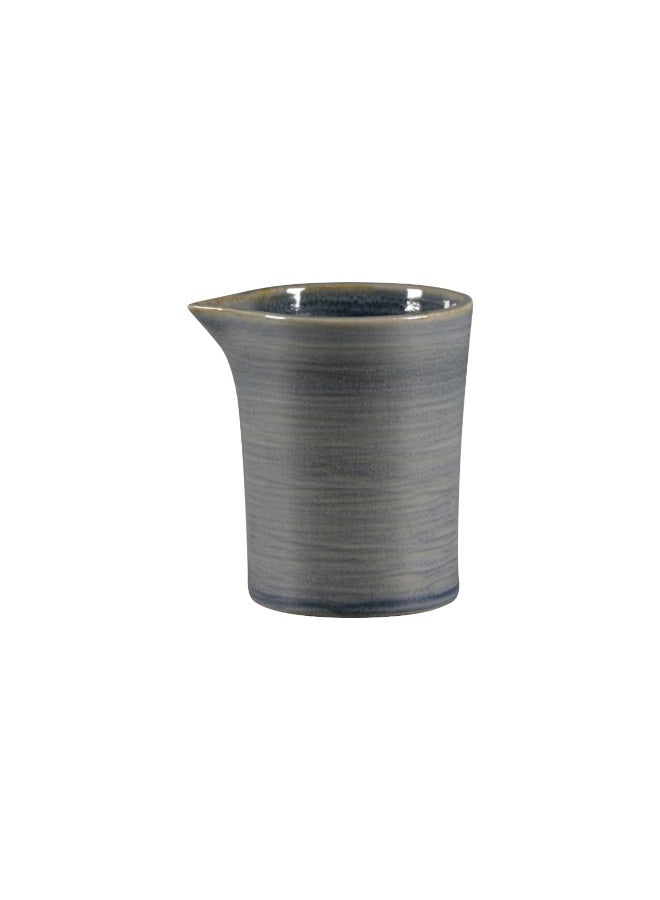 راك بورسلين كريمر بورسلان راك سبوت بلون الأزرق اليشم بدون مقبض – 15cl (5.05oz) | إبريق أنيق للحليب أو الكريمة مصنوع يدويًا من بورسلان راكستون الفاخر | تصميم فاخر وعصري يناسب المقاهي والمطاعم والمنازل | آمن للاستخدام في الميكروويف والفرن وغسالة الصحون | سعة مثالية لتقديم الحليب والكريمة والصلصات | تشطيب يدوي فريد لكل قطعة يضفي لمسة فنية أصيلة | تصميم عملي وخفيف الوزن مع متانة عالية للاستخدام اليومي والمهني | قطعة فاخرة تكمّل أي طاولة وتضيف لمسة من الأناقة والرقي - Image 1