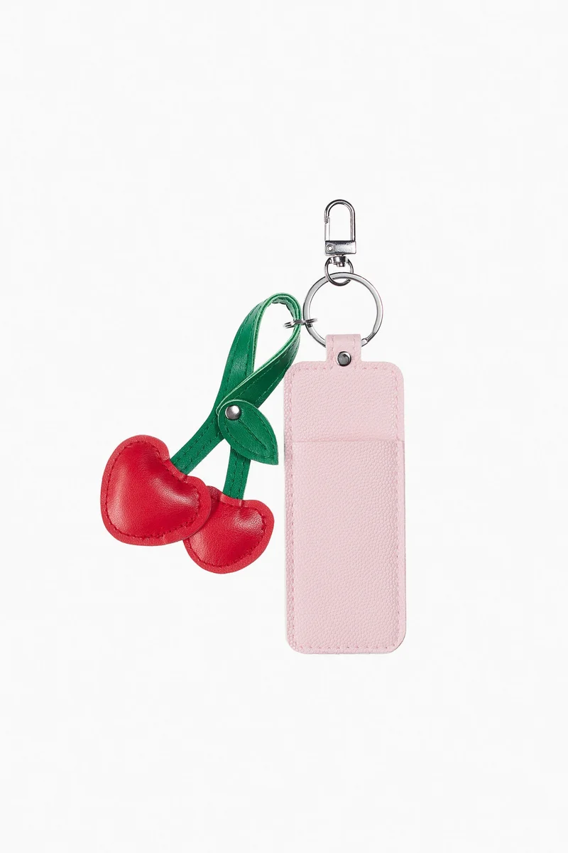 اتش اند ام علّاقة مفاتيح مزودة بحامل ملمع شفاه