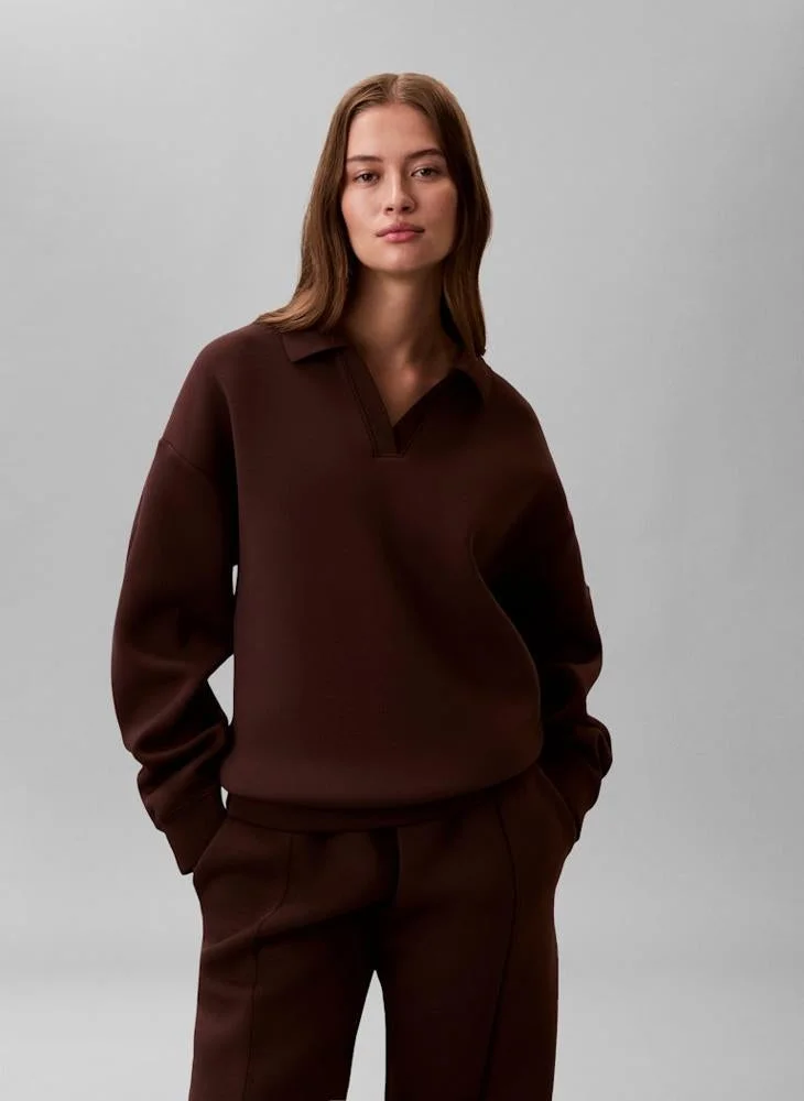 CALVIN KLEIN  Logo Oversized Polo Sweatshirt for Women | Best Price UAE