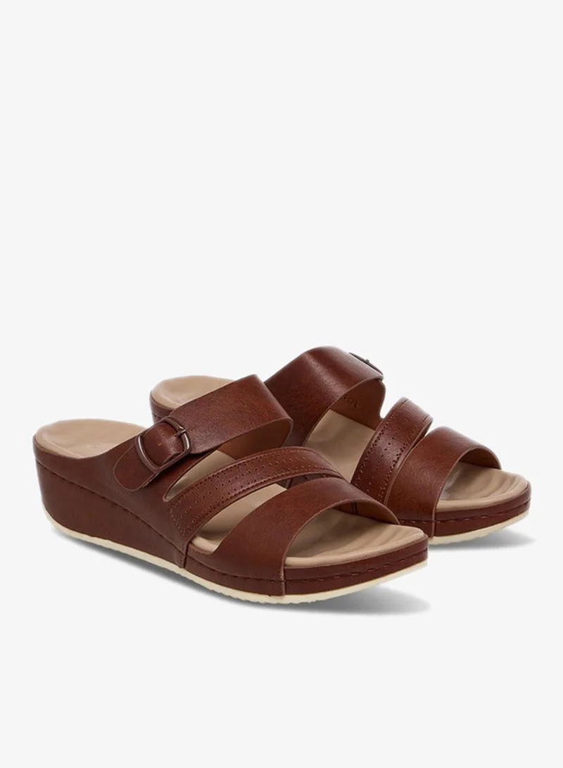 لو كونفورت صنادل سهلة الارتداء بكعب إسفيني