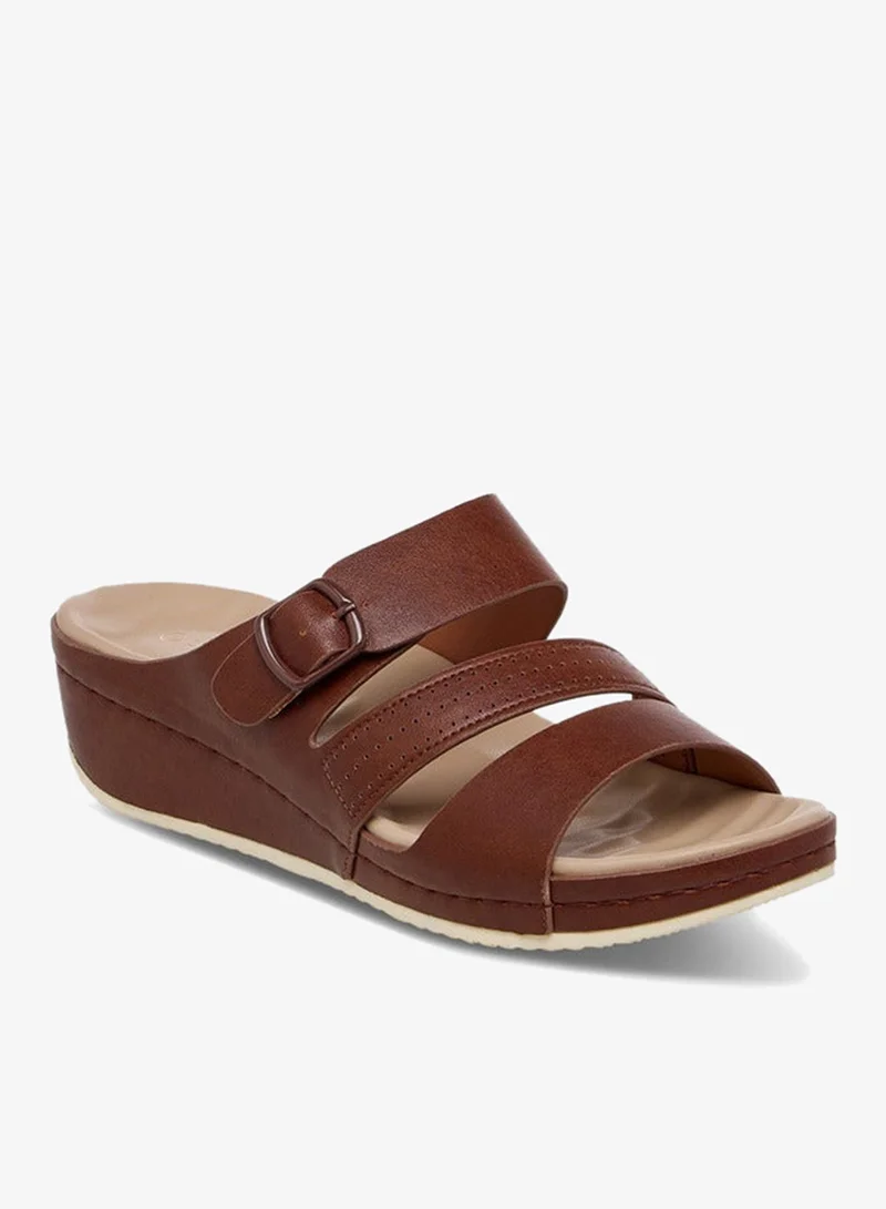 لو كونفورت صنادل سهلة الارتداء بكعب إسفيني