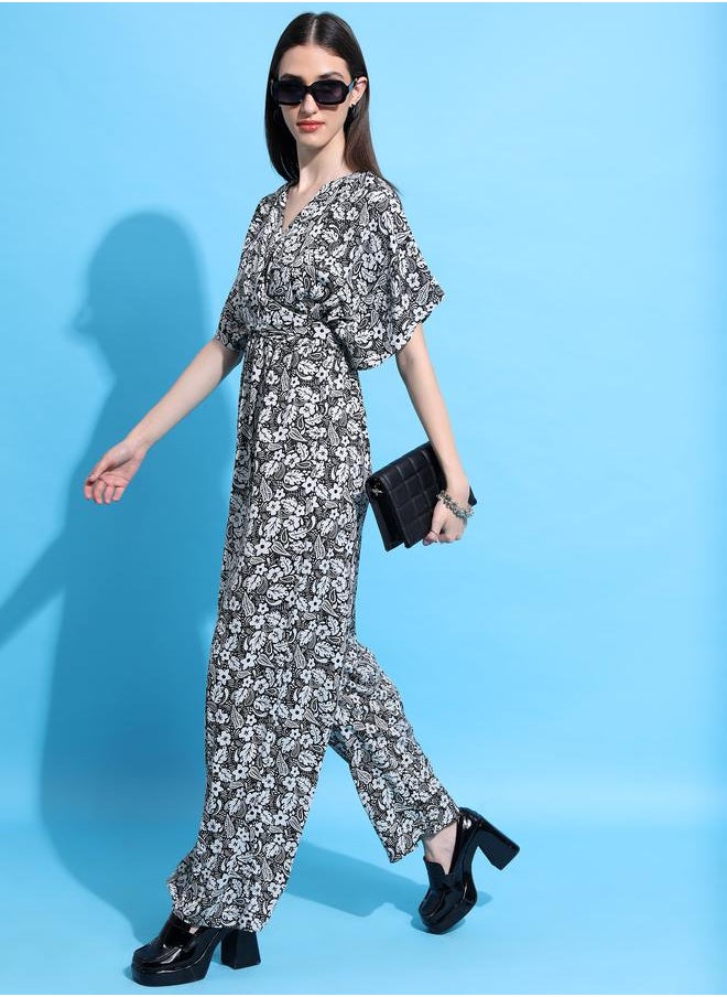 Tokyo Talkies Paisley Floral Print V Neck Front Twisted Jumpsuit by Styli  - Image 1