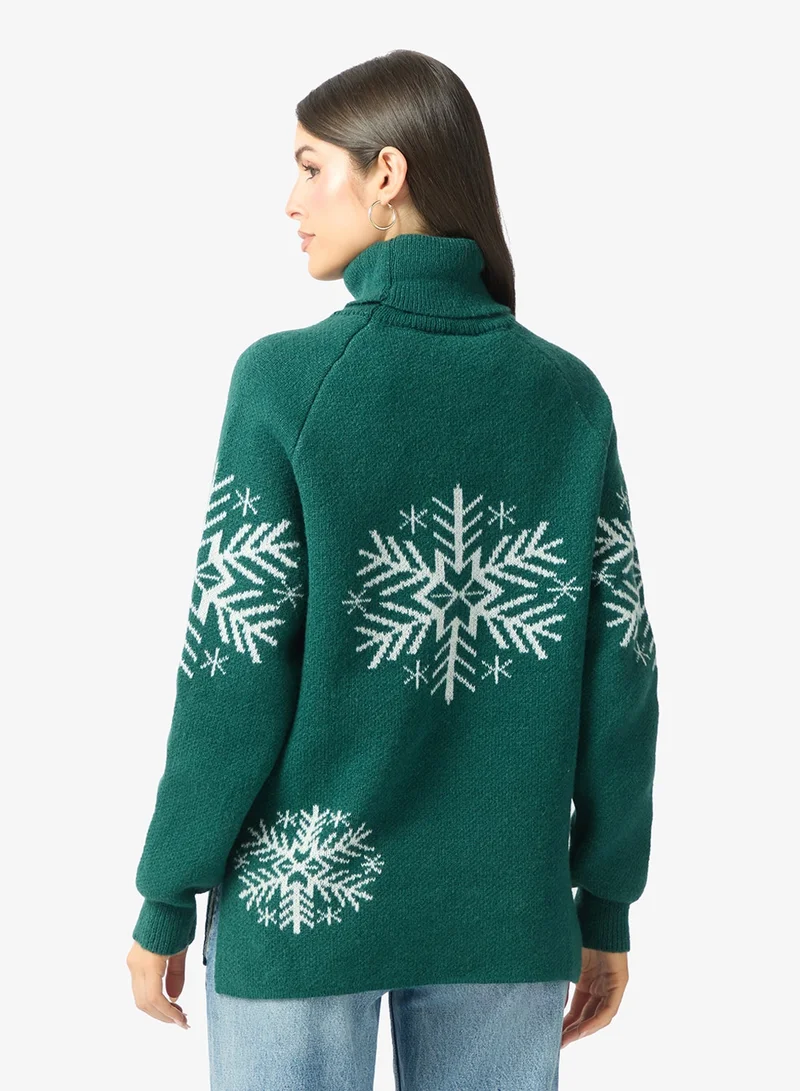 ايلا كنزة بياقة سلحفاة مطبوعة