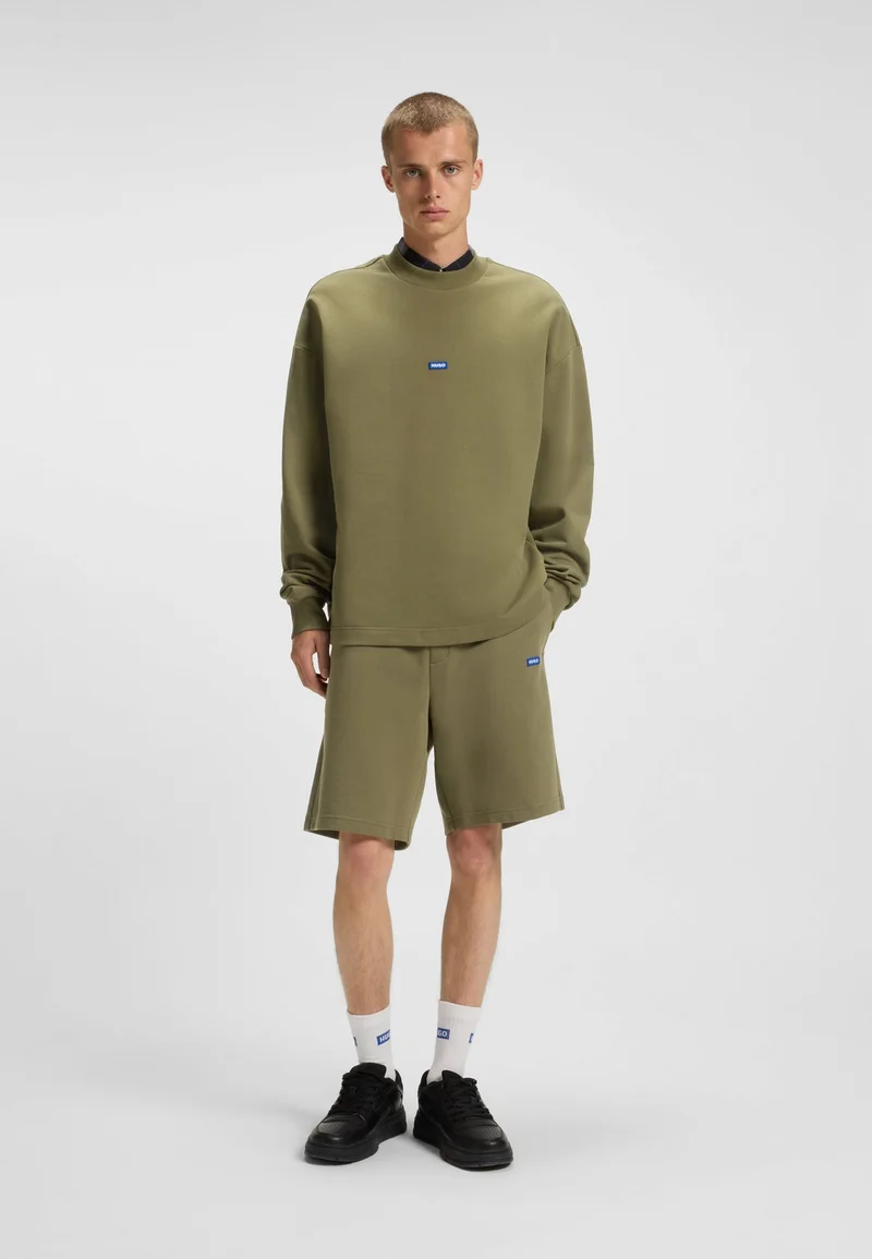 HUGO Open Green Cotton-terry sweatshirt with blue logo patch for Men | Best Price UAE