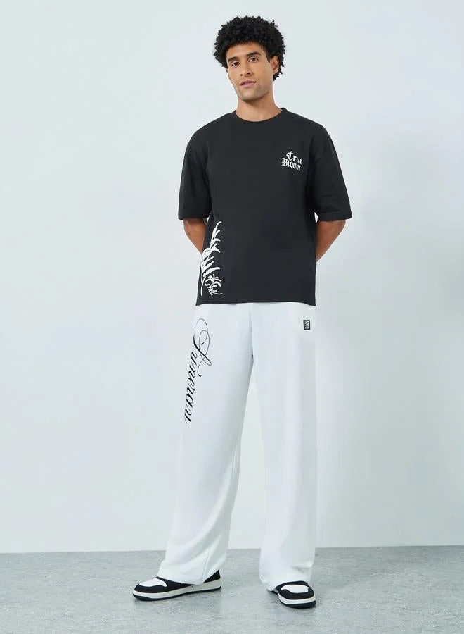 Styli Men Leaf Graphic Print Oversized T-Shirt