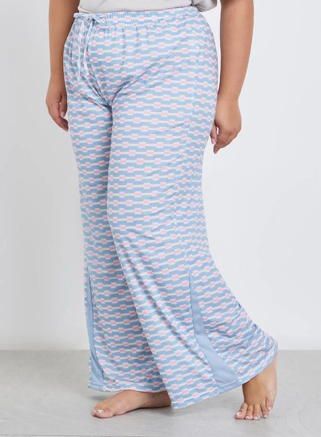 ستايلي طقم من بنطال بيجاما وتيشيرت بمقاس كبير