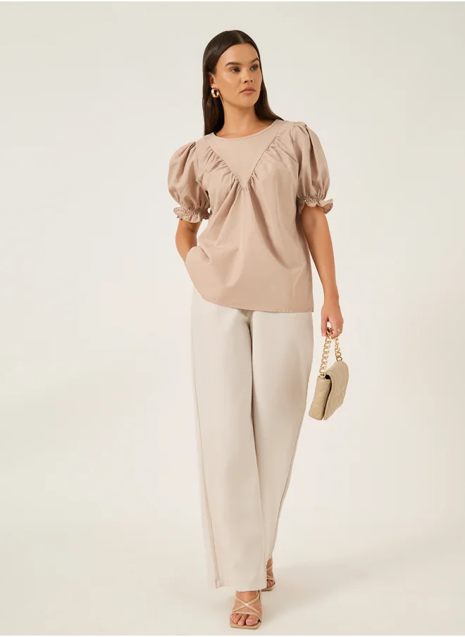 ستايلي Solid Puff Sleeves Top with Smocked Cuffs