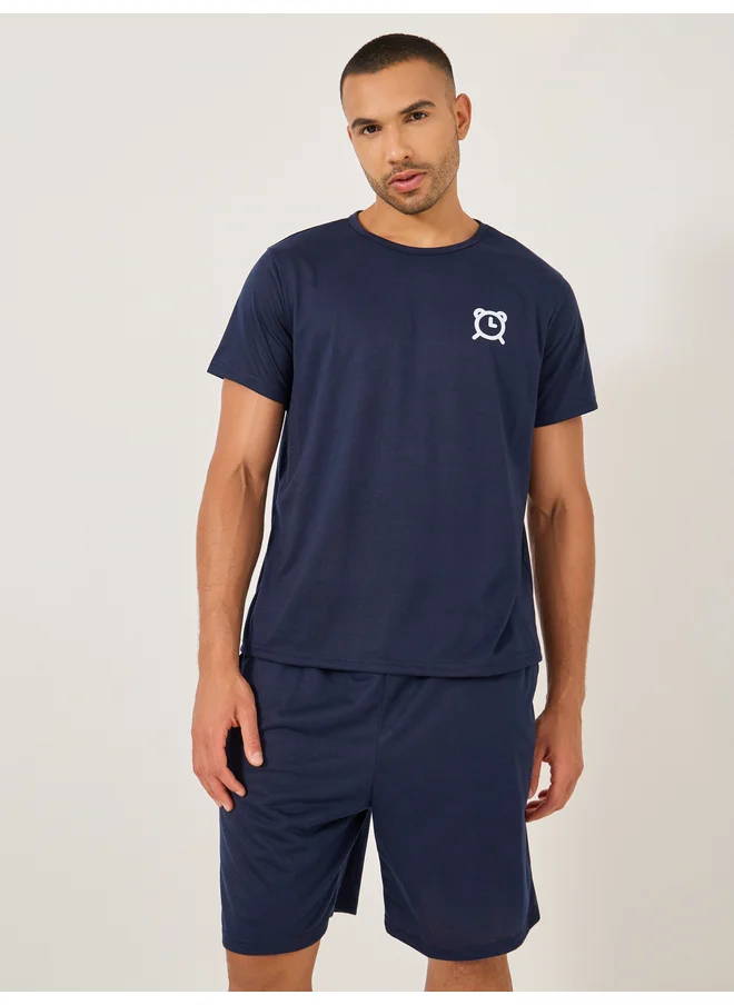 Styli Styli Unwind Slogan Front and Back Printed T-Shirt and Shorts Set