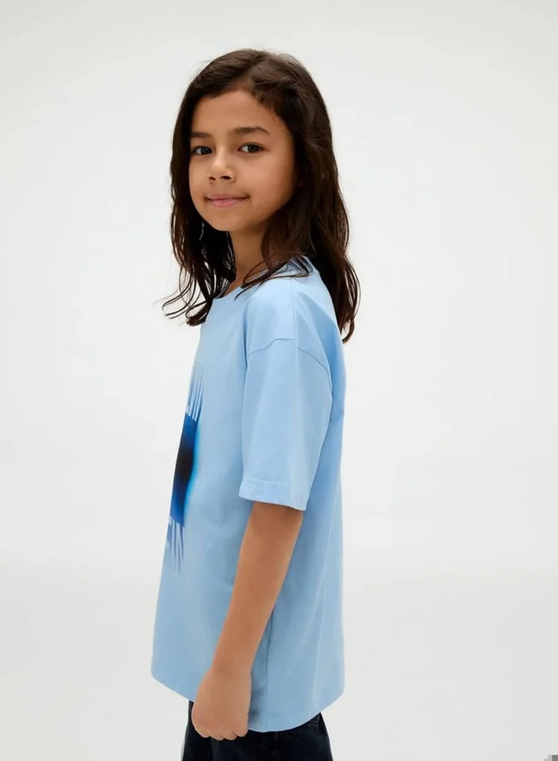 Calvin Klein Jeans Blue Bell Gradient Graphic Logo T-Shirt for Men | Best Price UAE