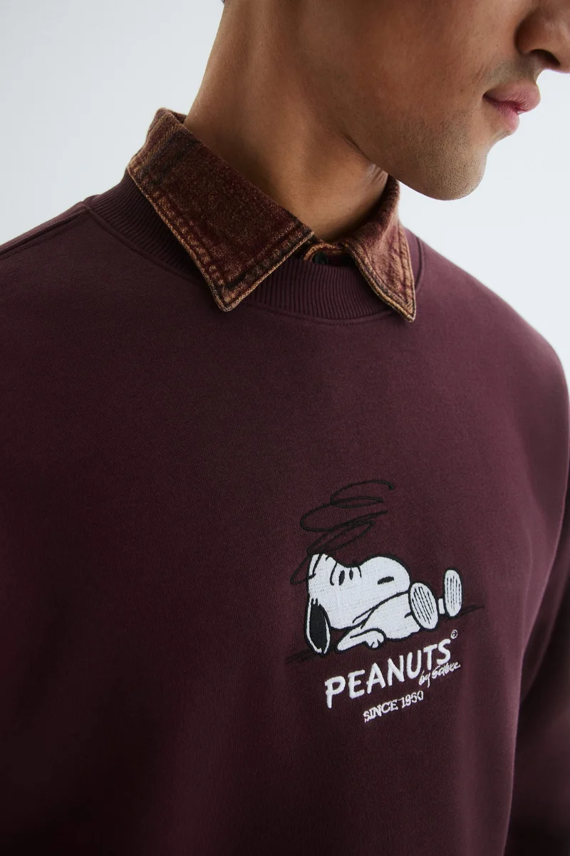 اتش اند ام سويت شيرت فضفاض بطبعة مميزة