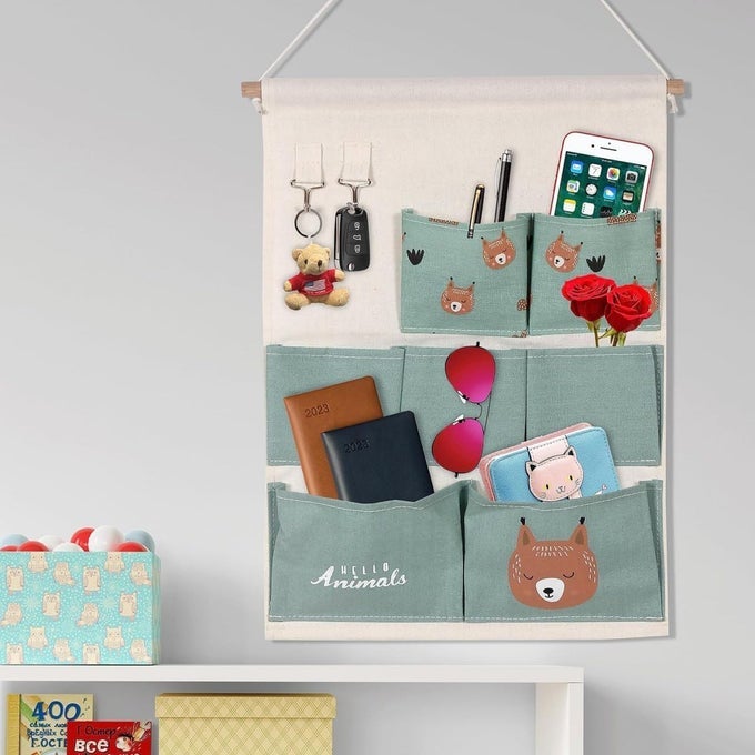 COTTON LINEN WALL HANGING STORAGE BAG WITH 7 POCKETS 2 HOOKS 35 X 50 CM MULTI DESIGN