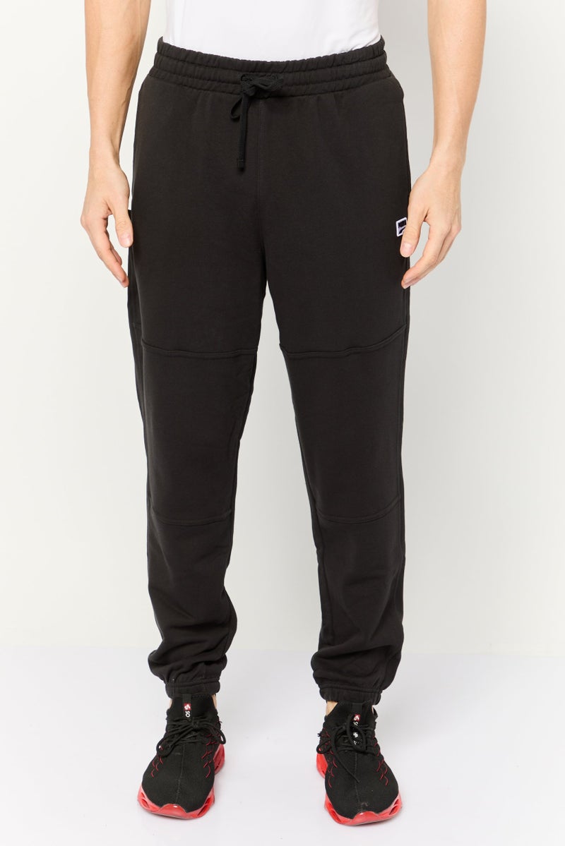 PUMA Men Relaxed Fit Training Sweatpants, Black  - Image 1