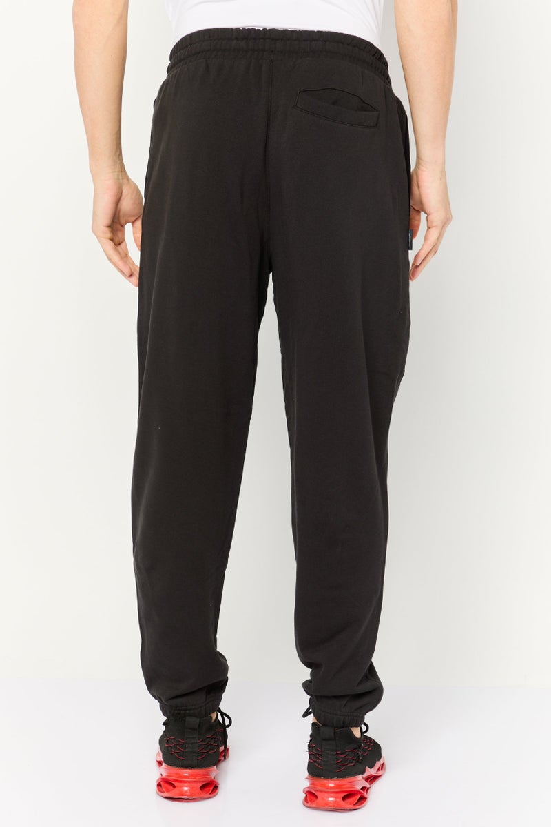 PUMA Men Relaxed Fit Training Sweatpants, Black  - Image 4