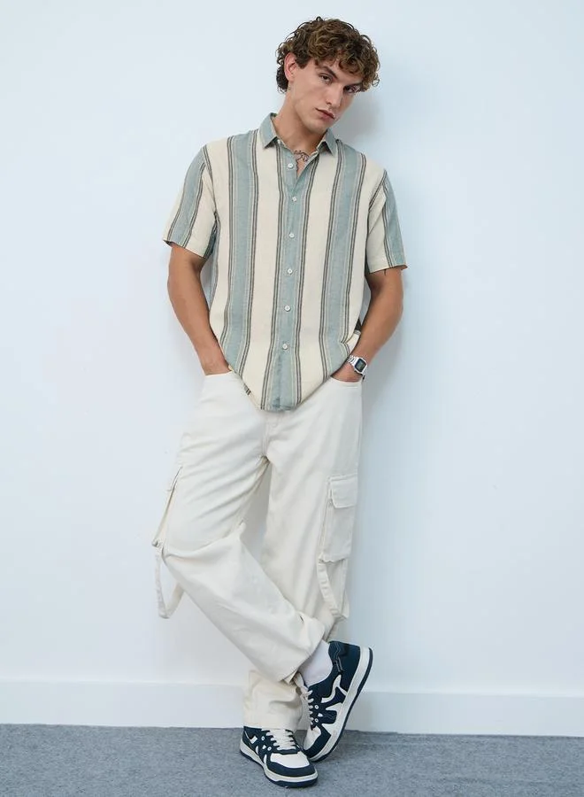 ذا سوليد ستور قميص مخطط من قماش قطني وكتان