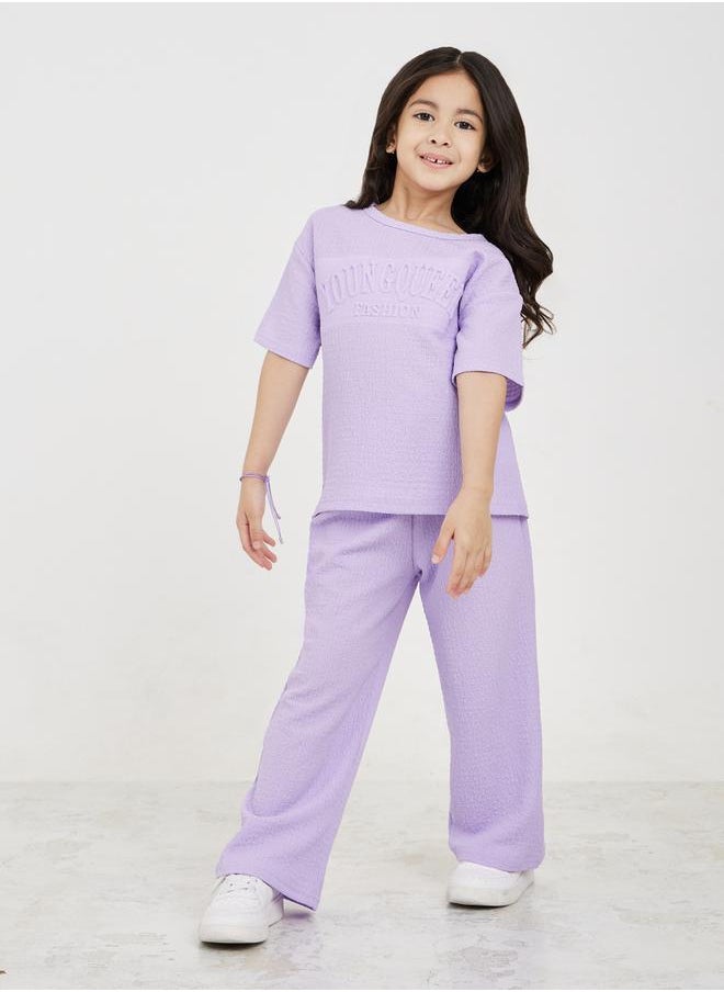 Styli - Embossed Textured T-Shirt & Wide Leg Pants Set - Image 1