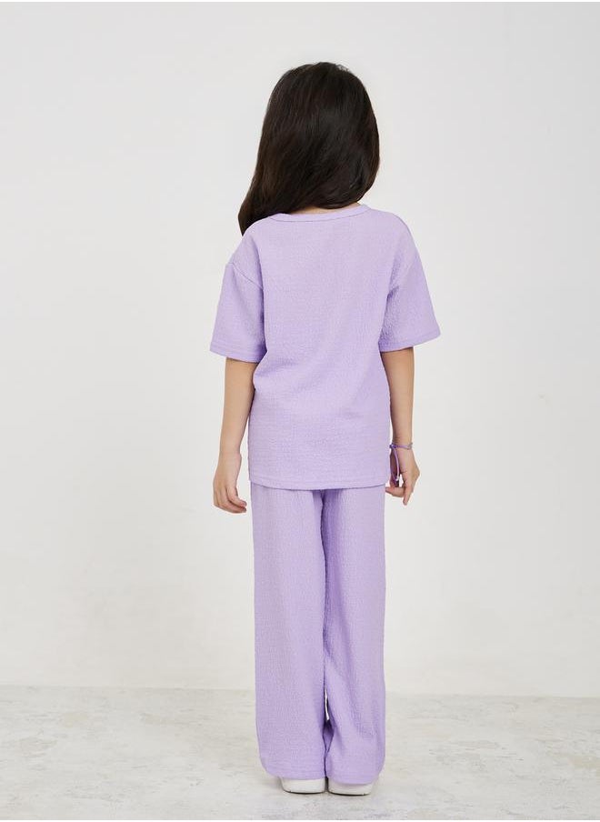 Styli - Embossed Textured T-Shirt & Wide Leg Pants Set - Image 1
