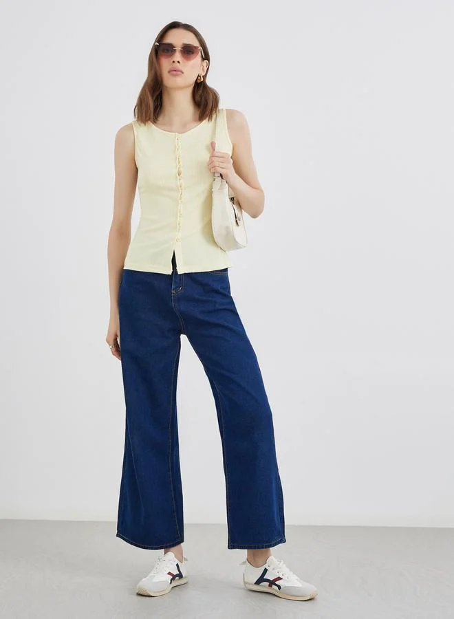 تايك تو بلوزة محبوكة بدون أكمام بأزرار وملمسين مختلفين