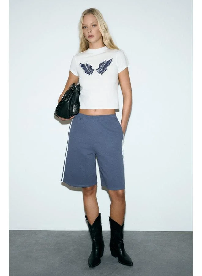 GRIMELANGE LLEONA Women's Stripe-Detail Double Pocket Organic Cotton Regular Indigo Shorts.