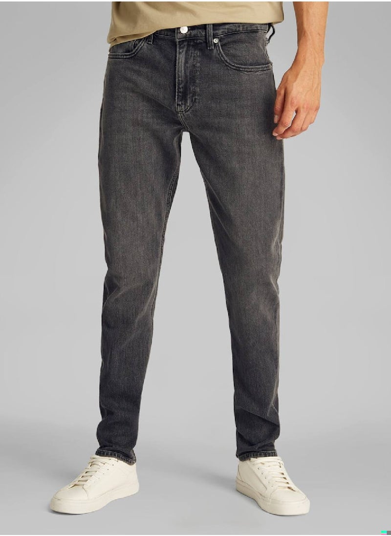 Calvin Klein Jeans Men's Slim Taper Jeans - Cotton, Black  - Image 1