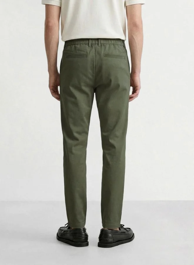 The Indian Garage Co Men Relaxed Fit Solid Cross Pocket Mid-Rise Trousers