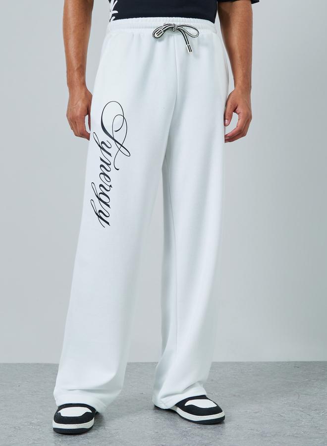 Styli Men Text Print Oversized Joggers - Image 1