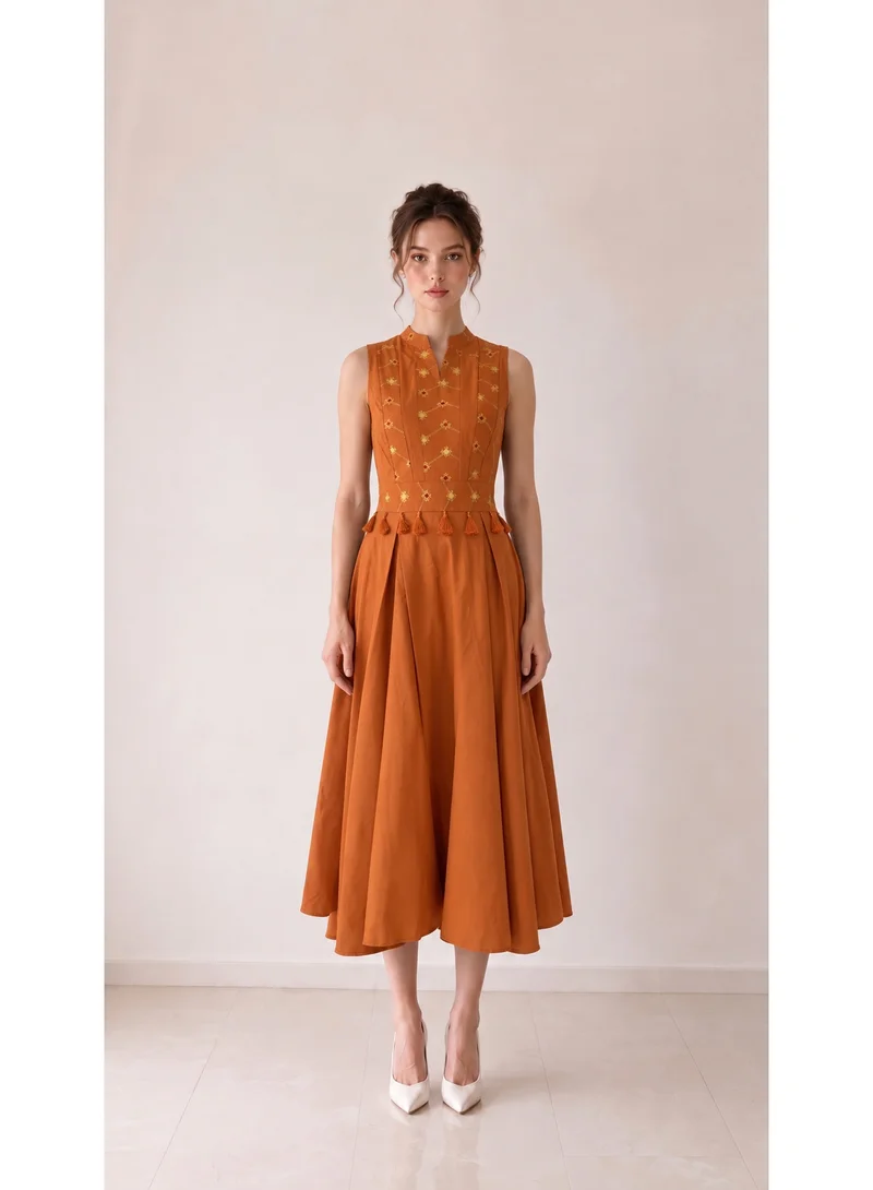 2Trendy Women's Sleeveless Mandarin Neck Midi Dress with Embroidered Bodice & Tassels