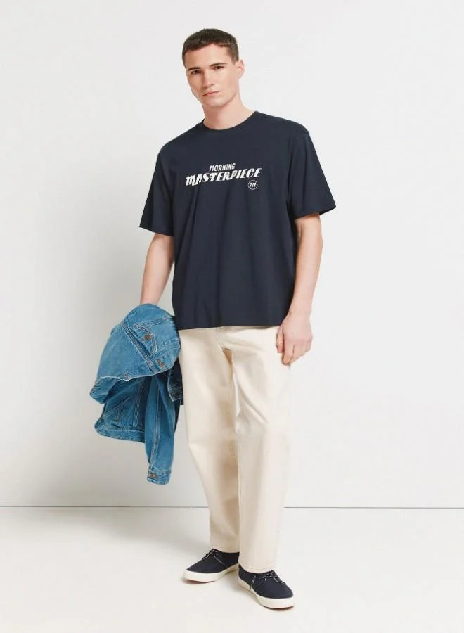 Springfield Cotton loose fit short-sleeved T-shirt with ribbed round neck, high-density chest prints and photographic back print.