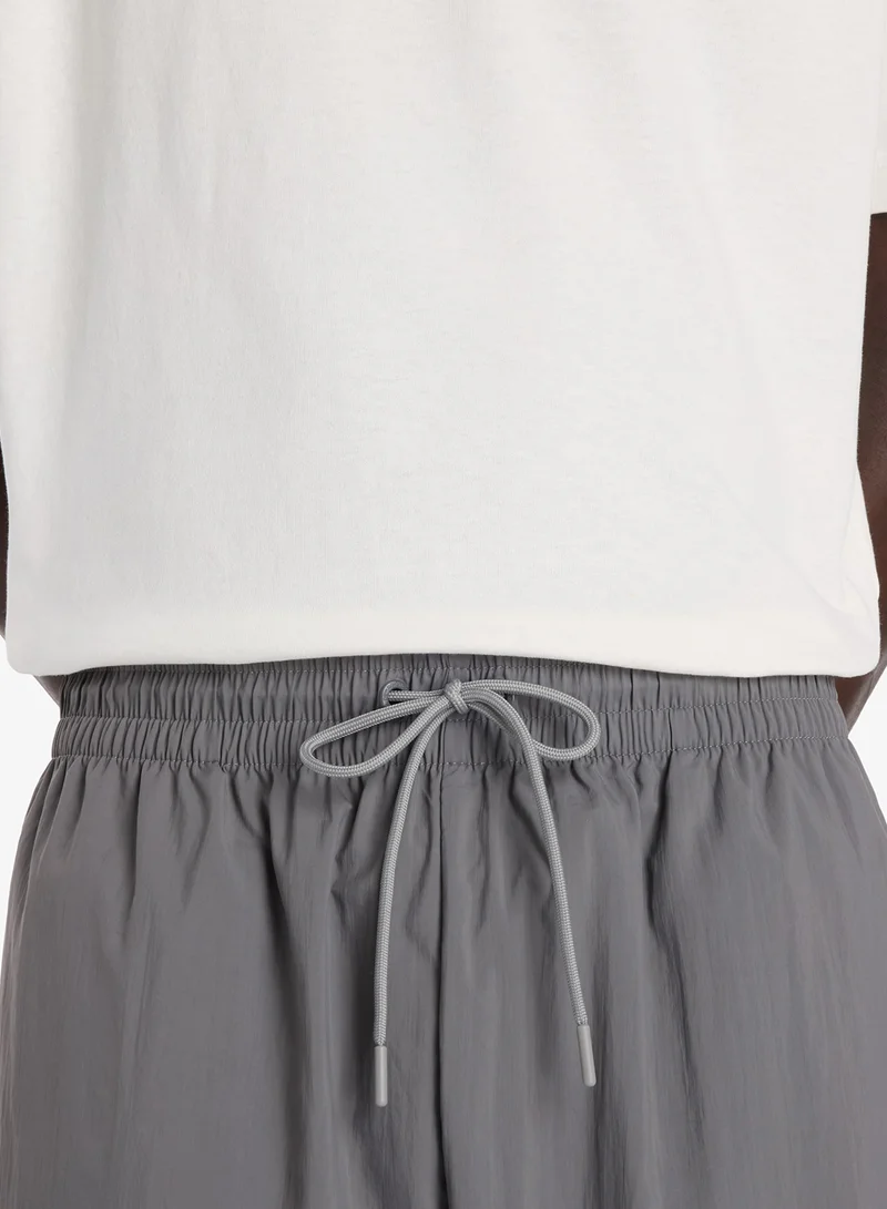 New Balance CASTLEROCK (CAS) Legacy Track Pants for Men | Best Price UAE