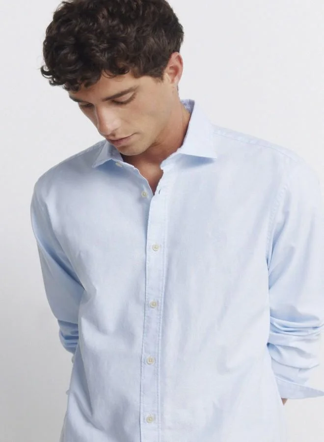 Springfield  Regular fit long-sleeved shirt. lightweight oxford fabric yarn-dyed 100% cotton. raw button and striped ribbon on the inner neck for decoration. Springfield logo embroidered in tone. for Men | Best Price UAE