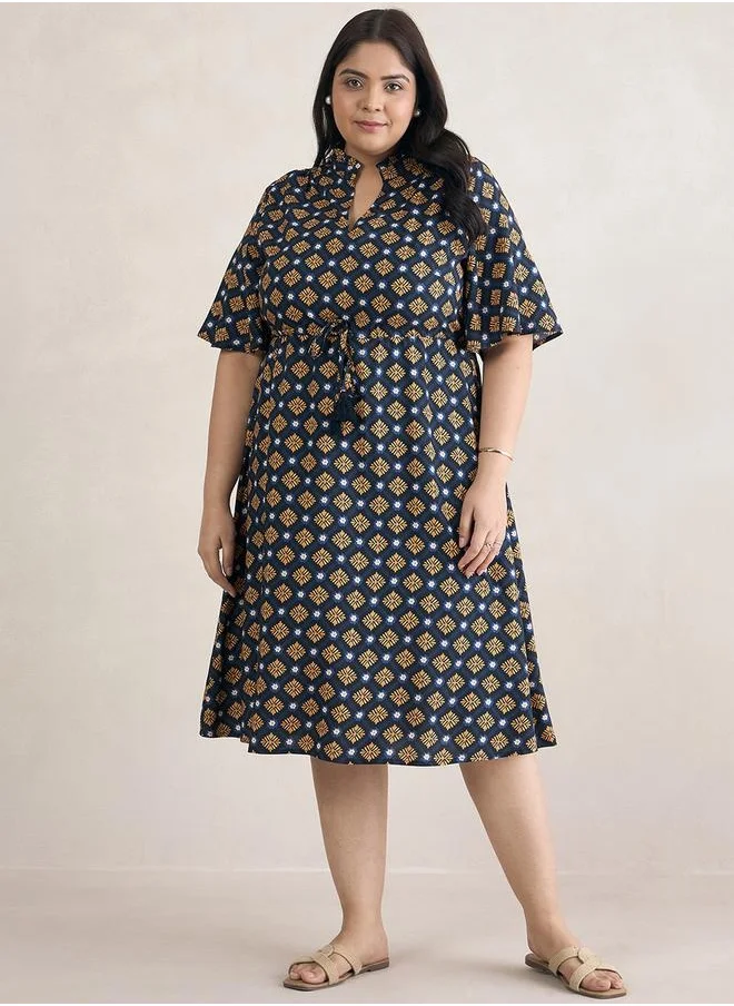 فيميلا Plus Size All-Over Print Drawstring Midi Dress by Styli