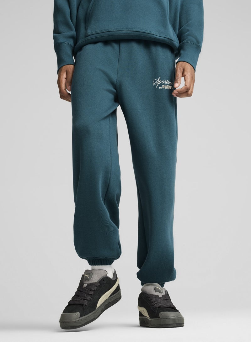 PUMA CLASSICS+ Mens Green Relaxed Sweatpants - Image 1
