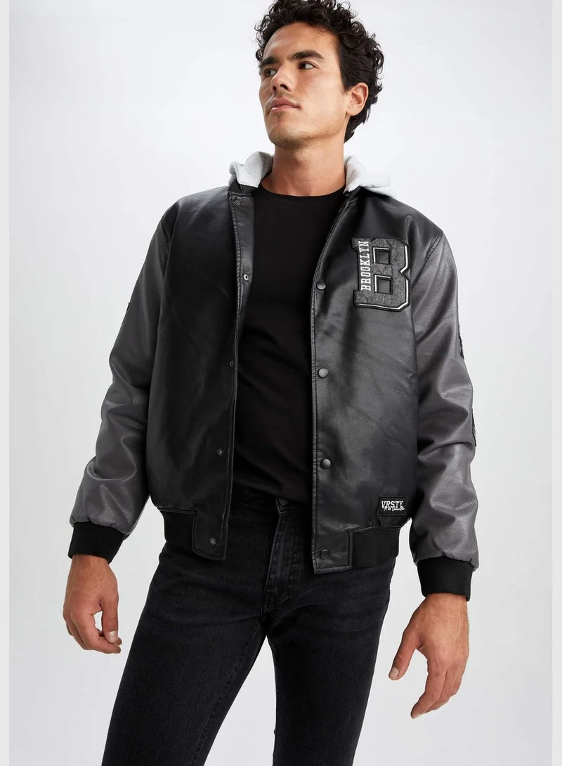 ديفاكتو Man Oversize Fit Hooded PU Jacket